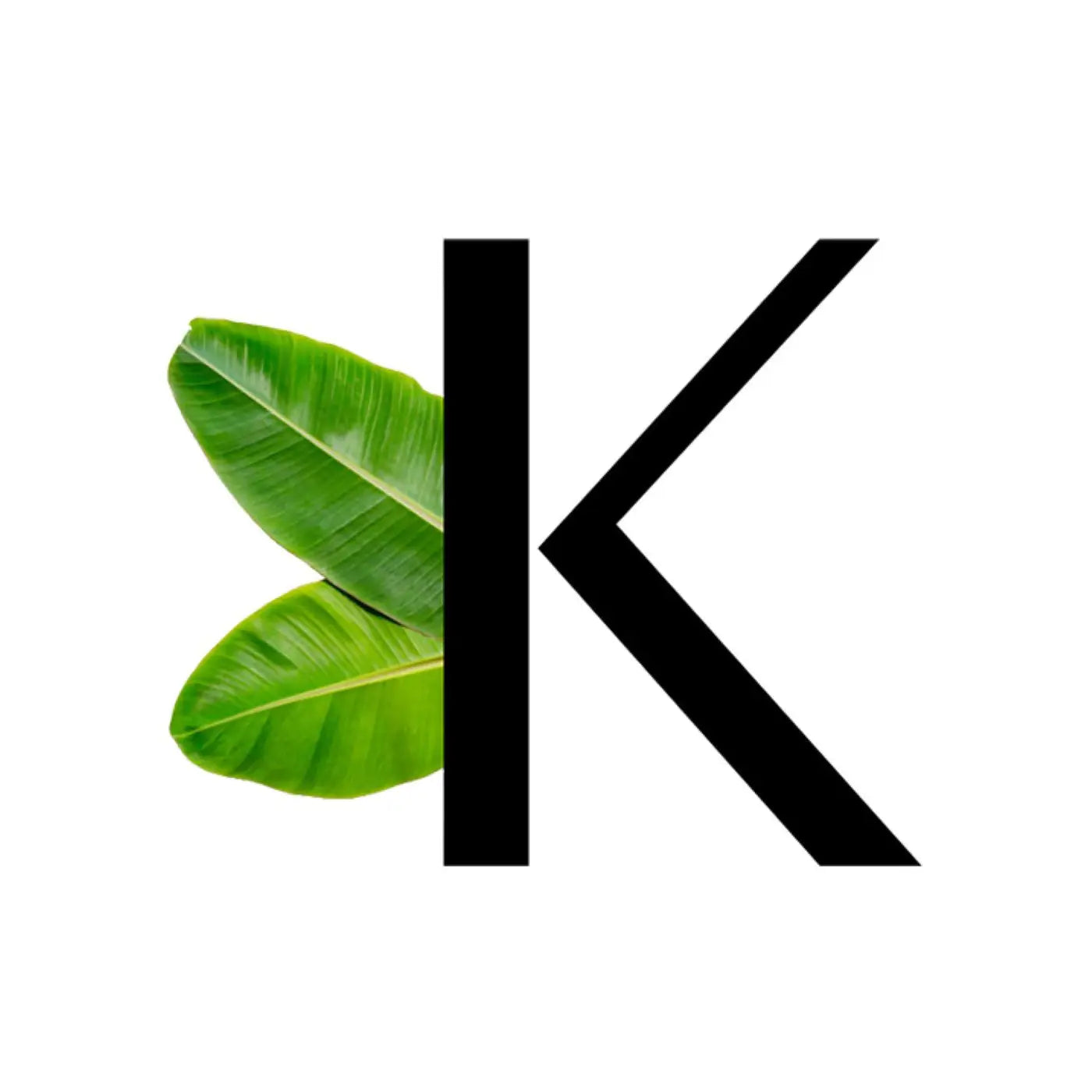 Logo K de Kadalys avec des feuilles de bananiers jaunes – ingrédient phare des soins naturels