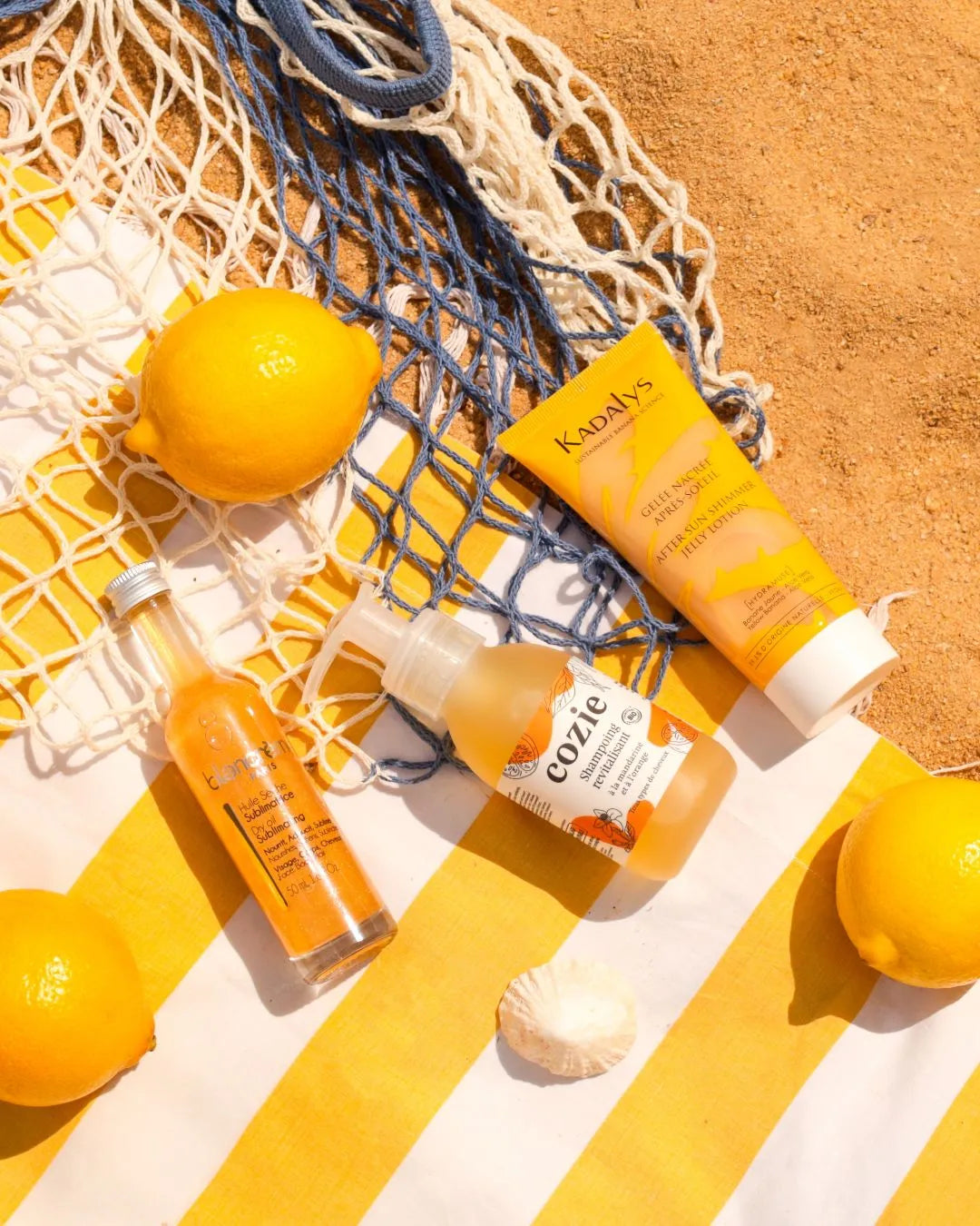 Focus sur les soins pour le corps et les cheveux de la box French Riviera : huile sublimatrice, shampoing revitalisant et gelée nacrée après-soleil, parfaits pour une routine estivale naturelle.